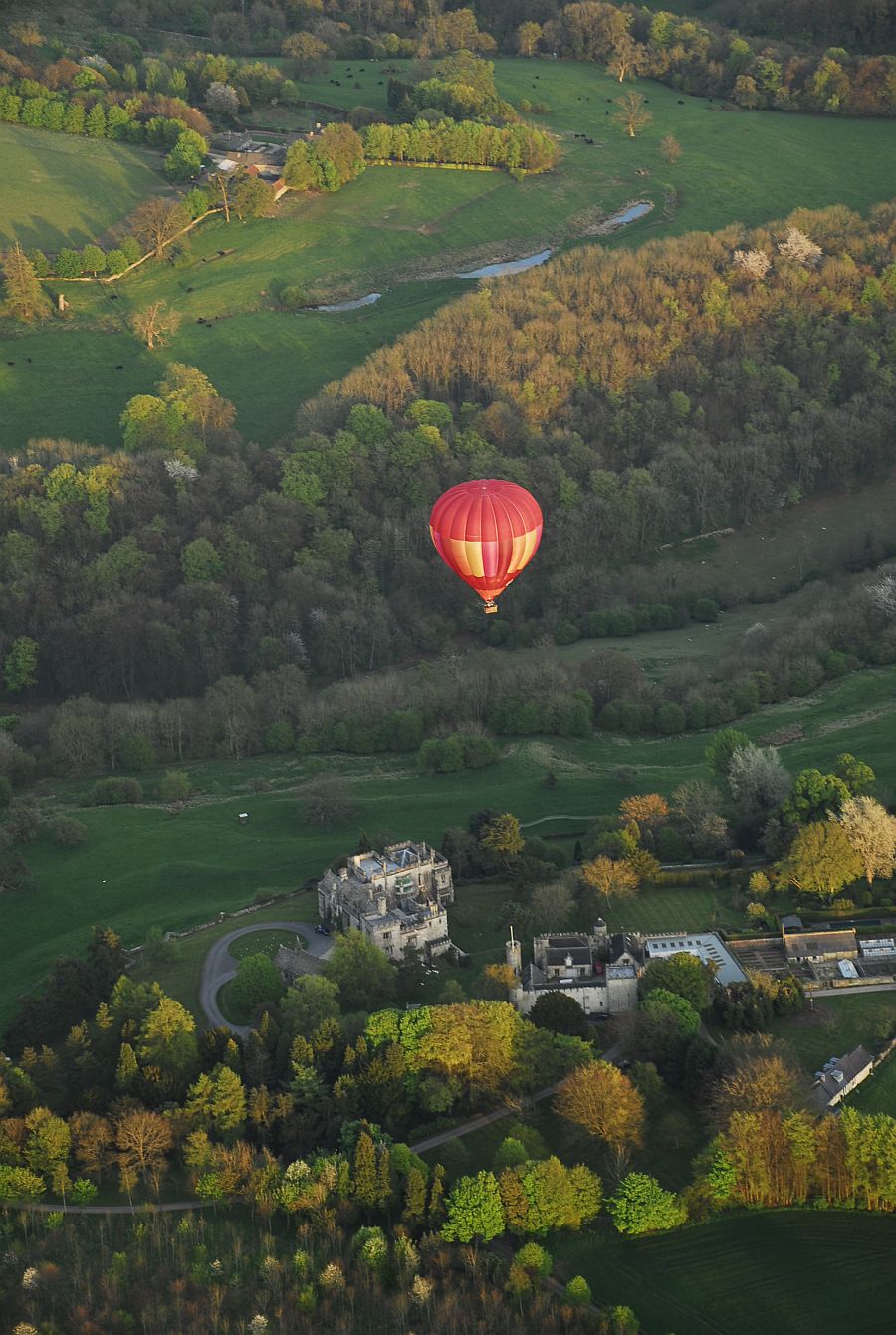 A hot air balloon flying over Lypiatt Park, near Stroud.